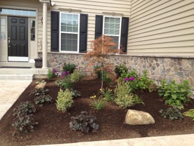 Bark mulch makes garden beds look fantastic. It improves a property's aesthetic quality.. Bark mulch makes garden beds look fantastic. It improves a property's aesthetic quality..