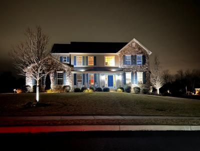 Lighting illuminating home and landscaping.