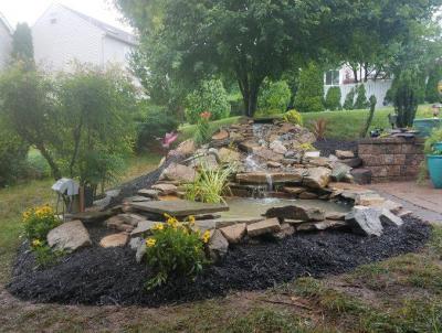 A water feature can create a tranquil ambiance in your outdoor space. A water feature can create a tranquil ambiance in your outdoor space.