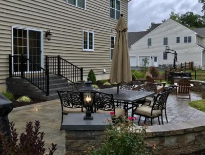 This wall adds visual interest and extra seating to our client's Downingtown patio.