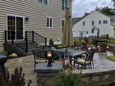 This wall adds visual interest and extra seating to our client's Downingtown patio. This wall adds visual interest and extra seating to our client's Downingtown patio.