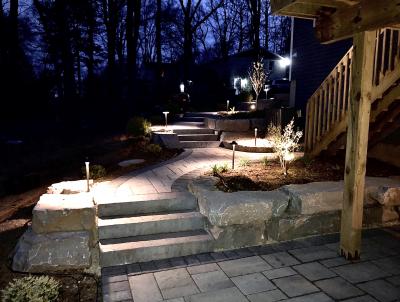 A walkway, steps and lighting in East Coventry, Pottstown that accommodates a sloped yard. A walkway, steps and lighting in East Coventry, Pottstown that accommodates a sloped yard.