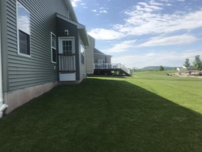 A new home in Douglassville awating a patio design to turn their blank backyard into a beautiful outdoor living space. A new home in Douglassville awating a patio design to turn their blank backyard into a beautiful outdoor living space.