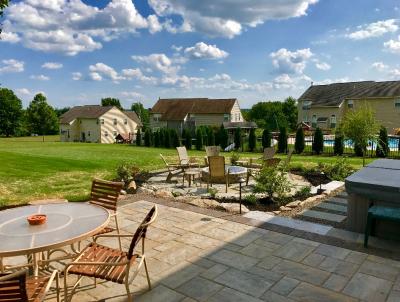 This multi level patio in Schwenksville creates two different outdoor living areas but totally accessible to one another. This multi level patio in Schwenksville creates two different outdoor living areas but totally accessible to one another.