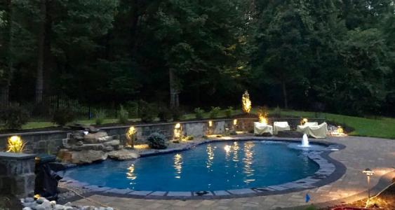 A pool and patio in Glenmoore has plenty of room for relaxation and entertaining.