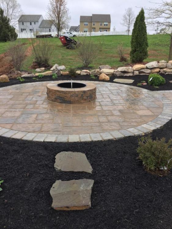 Valencia fire pit with Techo-Bloc Blue 60 pavers with soldier border in Pottstown, PA