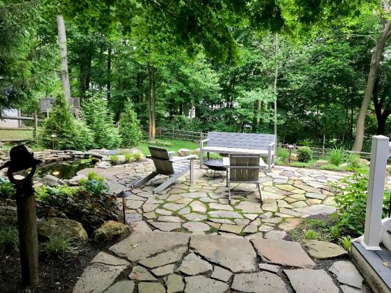 An example of a free form patio installed in Wayne, PA using Mountain Fieldstone