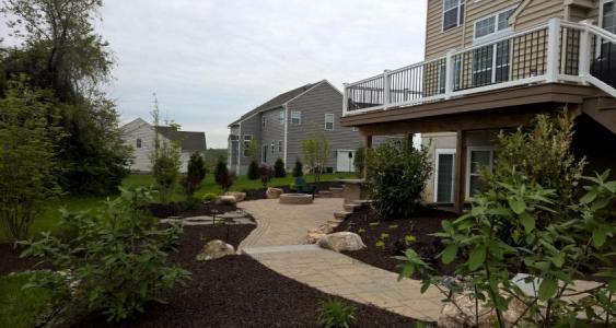 Newly planted shrubs will give this Downingtown patio lots of privacy.