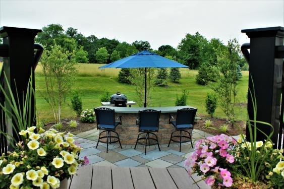 Hardscaping in Phoenixville include patio and island for eating.