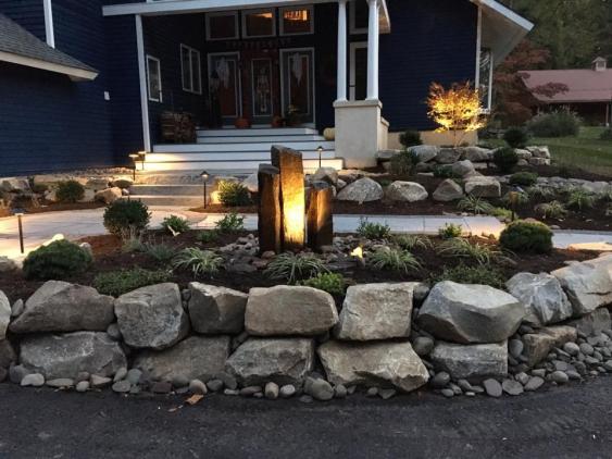 Hardscaping includes the use of natural stone. Front entrance in Spring City, PA