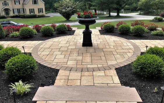 This hardscaped front entrance enhances the curb appeal at our client's Malvern home.