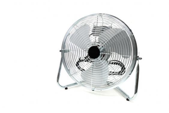 Mosquitoes are weak flyers so a fan will blow them away from you.