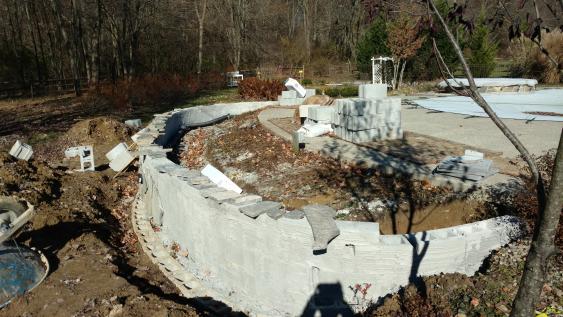 'Before' stone veneer is installed on Glenmoore retaining wal.l