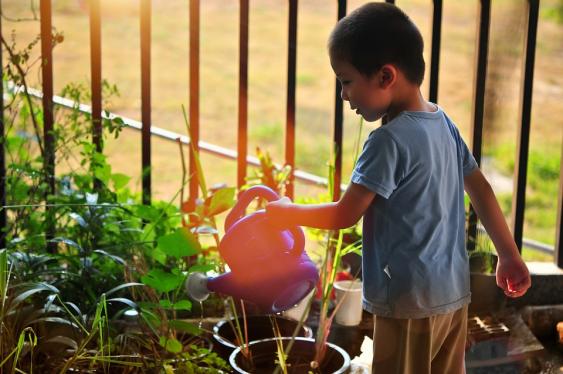 Gardening with children gets them outdoors.