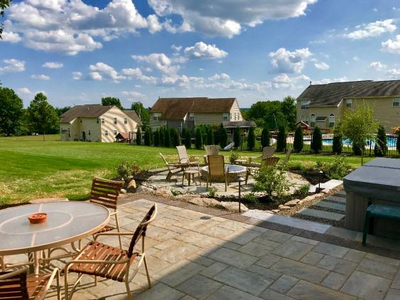 This multi level patio in Schwenksville creates two different outdoor living areas but totally accessible to one another.