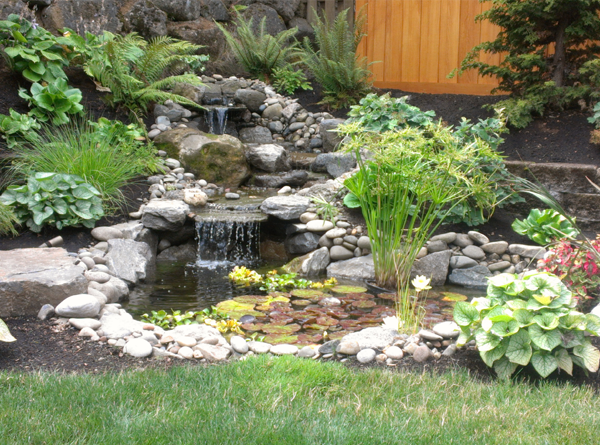 Landscaping With River Rock Whitehouse Landscaping river rock in water feature - Landscaping With River Rock Whitehouse Landscaping