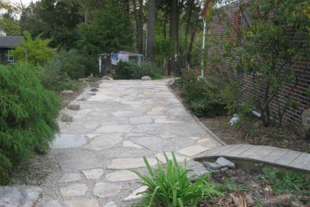 This dry-laid Boyertown, Pa flagstone walkway provides a wide, easy-care route.