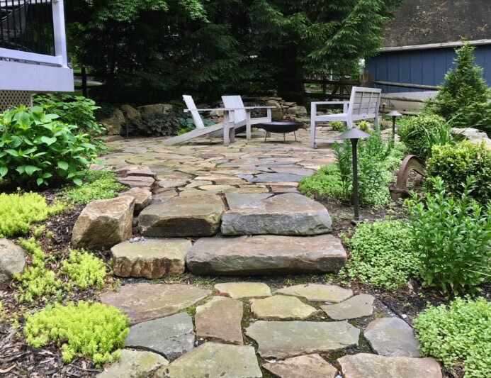 Irregular flagstone installation in Wayne with a rustic feel.